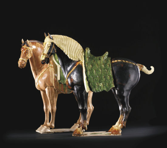 唐 三彩陶马(1对) 157.6万美元 2013年纽约苏富比秋拍 唐 三彩陶马(1对) 157.6万美元 2013年纽约苏富比秋拍