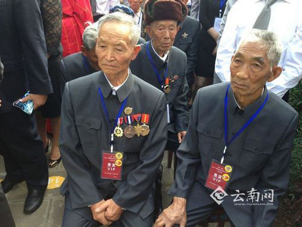 6月12日，2014年“忠魂归国”公益活动在云南省腾冲县举行。中国远征军在缅甸抗日阵亡将士的部分遗骸和墓地的圹兆土将被装于24个骨灰罐，归葬在云南省腾冲国殇墓园的中国远征军阵亡将士墓。此时，距离这些将士出国远征，已过去了70馀年。图片来源：云南网1