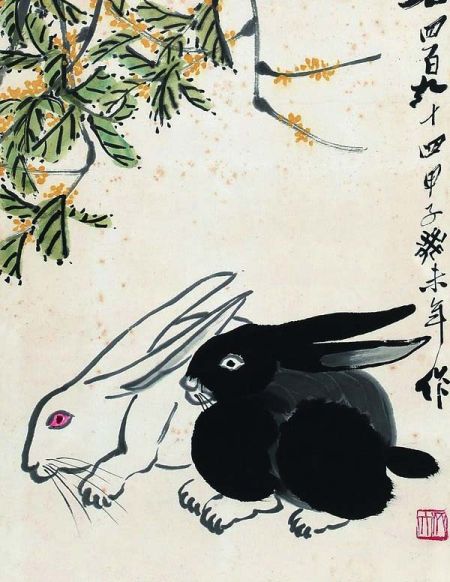 图为齐白石《丹桂双兔》(局部) 图为齐白石《丹桂双兔》(局部)