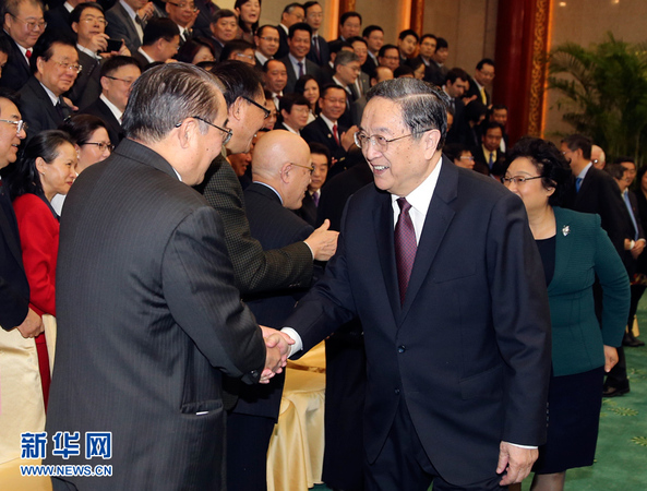 12月15日，中共中央政治局常委、全国政协主席俞正声在北京会见参加“纪念中美建交35周年研讨会”的侨界和专家学者代表。 新华社记者丁林 摄