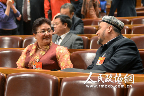 卓嘎、阿布里米提?艾合买托合提