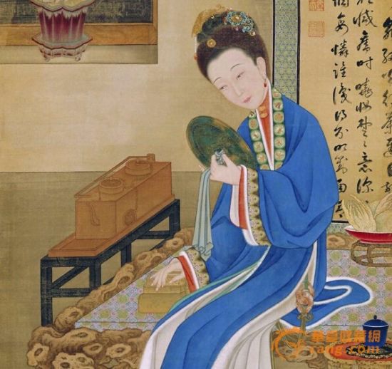 　　《裘装对镜图》中的佛手香橼，一旁的水仙也揭示其季节