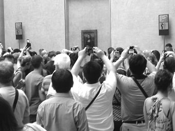 《蒙娜丽莎》画像前人头攒动        (资料图片) 《蒙娜丽莎》画像前人头攒动        (资料图片)