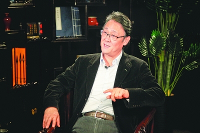 谭利华近照 本报记者 周官正摄 谭利华近照 本报记者 周官正摄