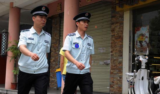 国务院:归并执法队伍 城管协管人数禁超在编人员2 国务院:归并执法队伍 城管协管人数禁超在编人员2