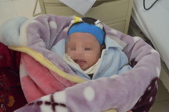 涉案的女婴。楚天都市报 图