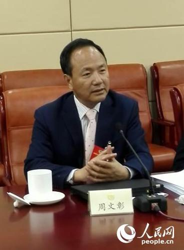 全国政协委员、国家行政学院原副院长周文彰