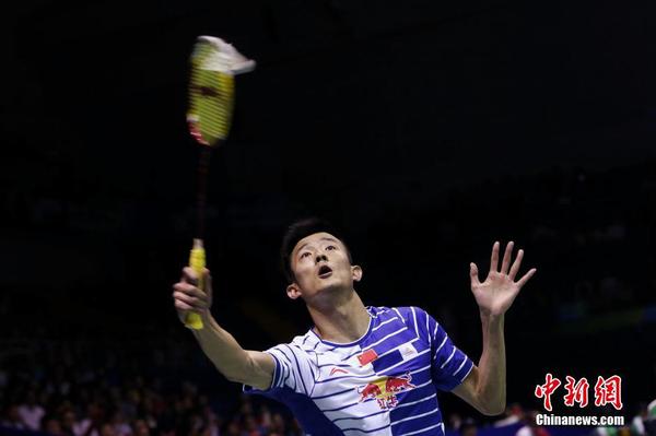 5月19日，中国队选手谌龙在比赛中回球。中新社记者 韩海丹 摄