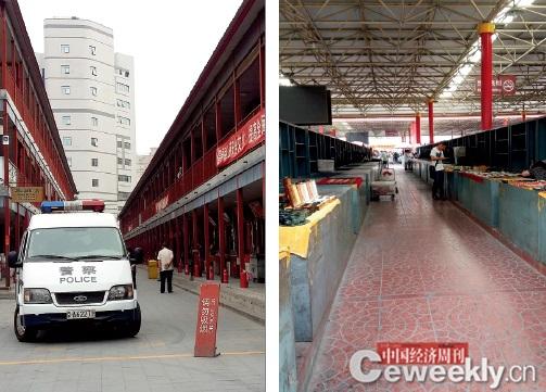 5月30日、31 日，上千商户因不满市场管理方——北京潘家园旧货市场有限公司要求摊主限期签订租赁合同的做法，选择集体停止营业，要求就摊位的产权和潘家园市场平等对话协商。6月3日，仍有部分摊位空置，摊主未出摊。市场内出现了警车。（《中国经济周刊》记者 姚冬琴|摄）