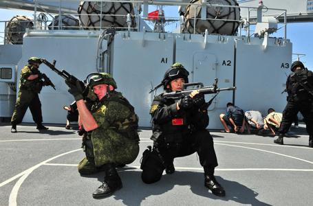 专家披露中俄南海演习内容:美日军机将聚集侦察