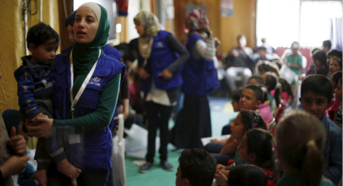 美媒:美国基本完成2016财年接纳8.5万名难民目标