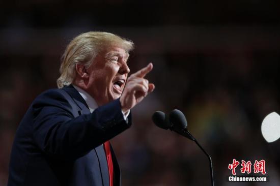 资料图:美国共和党总统候选人特朗普。 <a target='_blank' href='http://www.chinanews.com/'>中新社</a>记者 廖攀 摄 点击进入下一页