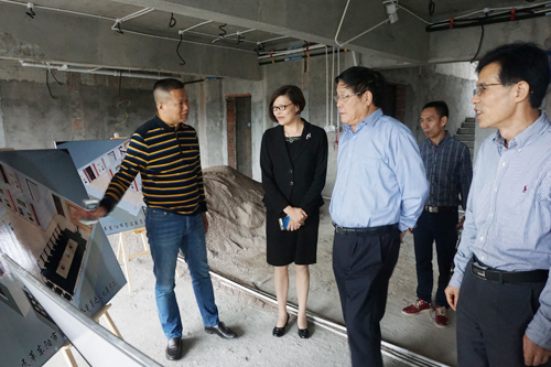 调研组一行视察建设中的东阳民革之家 调研组一行视察建设中的东阳民革之家