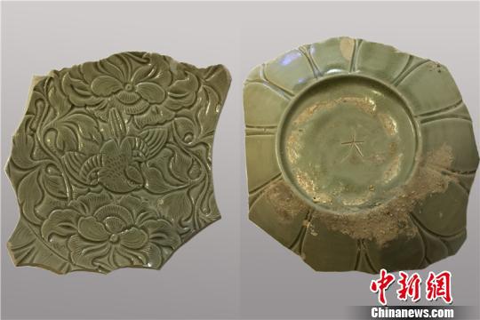 图为出土的雀绕牡丹纹钵 宁波市文物考古研究所供图 图为出土的雀绕牡丹纹钵 宁波市文物考古研究所供图