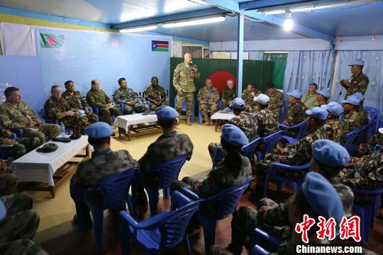 与各出兵国调研。　李欣 摄