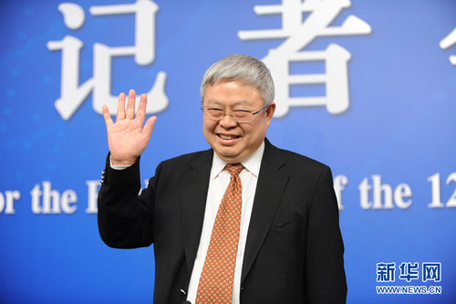 图为国务院扶贫办主任刘永富