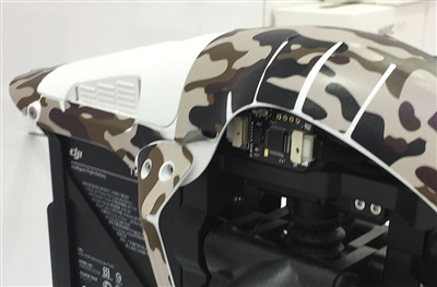 机壳内加装电子?？?红圈处)定位，可让无人机飞入禁飞区。
