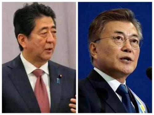 资料图:安倍与文在寅 资料图:安倍与文在寅