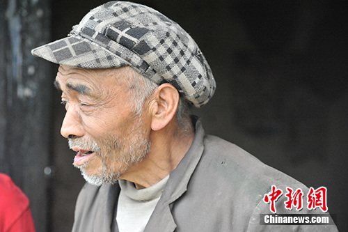 板厂村村民徐仁忠。<a target='_blank' href='http://www.chinanews.com/' >中新网</a>记者 宋宇晟 摄 点击进入下一页