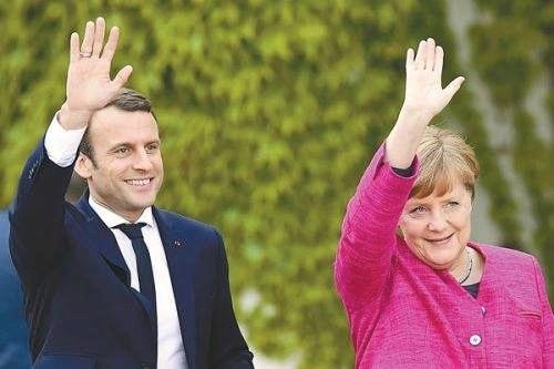 马克龙与德国总理默克尔。