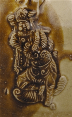 胡人吹横笛贴塑纹样_b