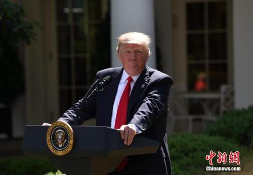 当地时间6月1日，美国总统特朗普在白宫宣布，美国将退出《巴黎协定》。他同时强调，美国也许会重返有关应对气候变化的协定，但前提条件是协定必须要对美国更加“公平”。 <a target='_blank' href='http://www.chinanews.com/'>中新社</a>记者 刁海洋 摄