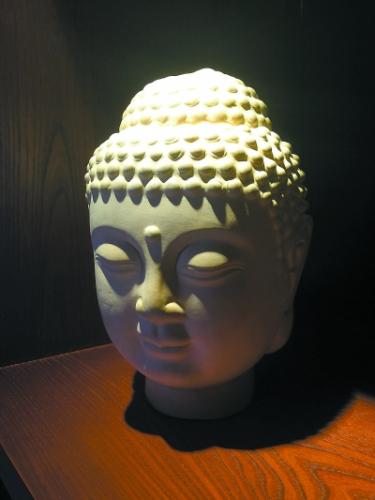 赵伟范制的葫芦佛头像。