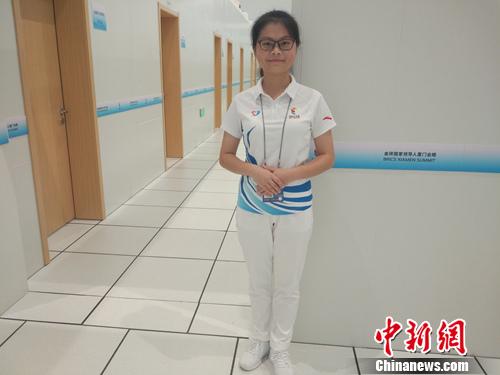 志愿者韩淑瑜。<a target='_blank' href='http://www.chinanews.com/' >中新网</a>记者 李金磊 摄