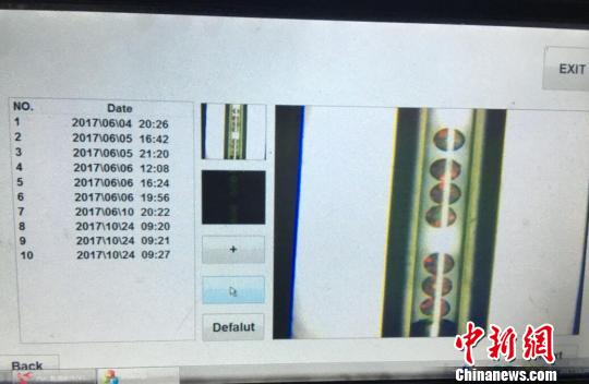 在这台光子晶体微球自动化检测仪的屏幕上，检测结果全程可视化?！∩耆?摄