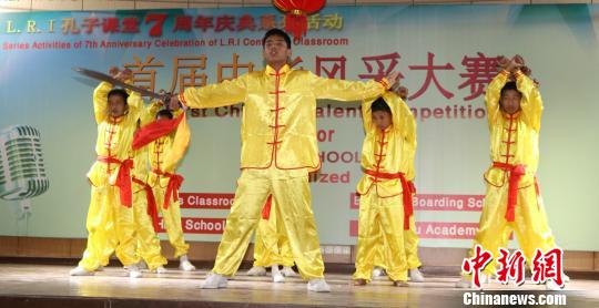 图为比赛现场?！≌懦恳?摄