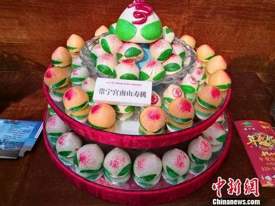 图为展出的面花?！〉程镆?摄