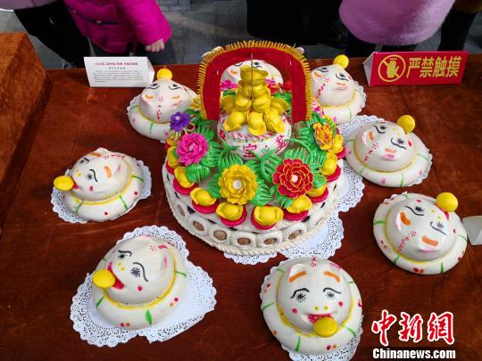 图为展出的面花?！〉程镆?摄