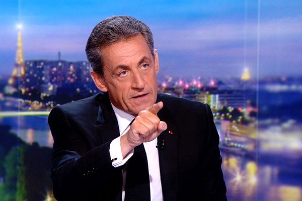 萨科齐破口大骂式自辩:卡扎菲是疯子 爆料人是流氓