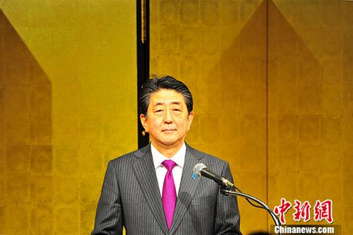资料图片:日本首相安倍晋三。 点击进入下一页