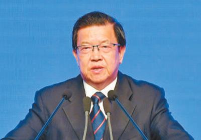 龙永图 图片来源:人民日报 点击进入下一页