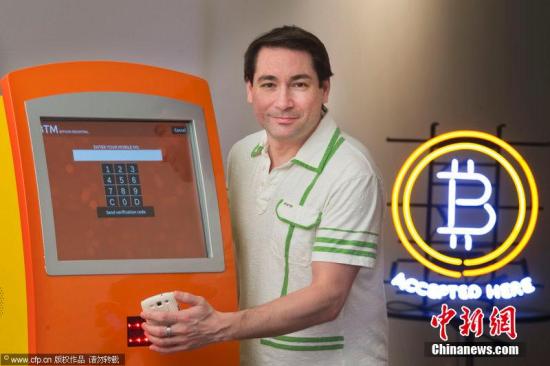 当地时间2014年1月14日，加拿大多伦多，多伦多第一台比特币ATM亮相。图片来源：CFP视觉中国