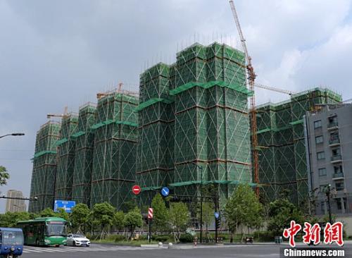 资料图：浙江杭州一楼盘正在建设中。<a target='_blank' href='http://www.chinanews.com/'>中新社</a>记者 王 刚 摄