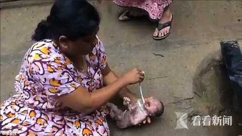 ff6640b6d22a8425b6a61830ca4e3b76.jpg 新生男婴被弃阴沟 女子将其掏出取名自由