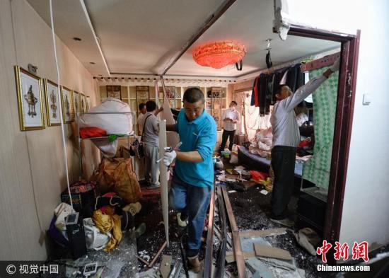 资料图：整治群租现象。图片来源：视觉中国