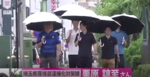 男人撑太阳伞很娘?日本男性组织撑伞小队欲正名