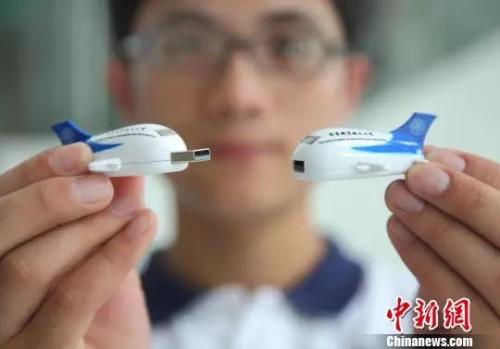 现在的u盘更多以礼品等形式出现。泱波 摄