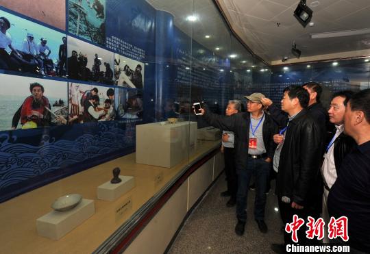 本次文物展通过文物展出、图片展示、文字介绍等方式，让游客进行一次探秘之旅?！〕陆ü?摄