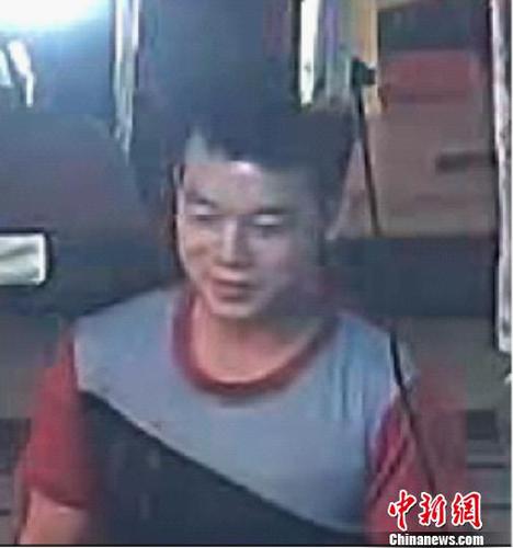 嫌犯覃志钢 警方供图 摄 嫌犯覃志钢 警方供图 摄