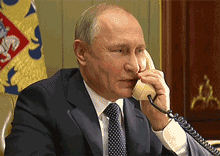 普京给14岁小男孩当司机系安全带 还送他特别礼物