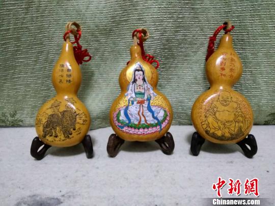 扁圆葫芦雕作品 万志雄 摄 扁圆葫芦雕作品 万志雄 摄