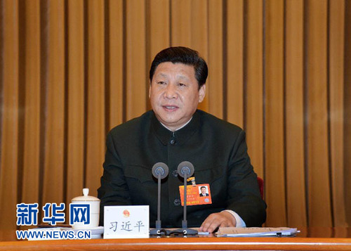 3月11日，中共中央总书记、中共中央军委主席习近平出席十二届全国人大一次会议解放军代表团全体会议并发表重要讲话。李刚 摄