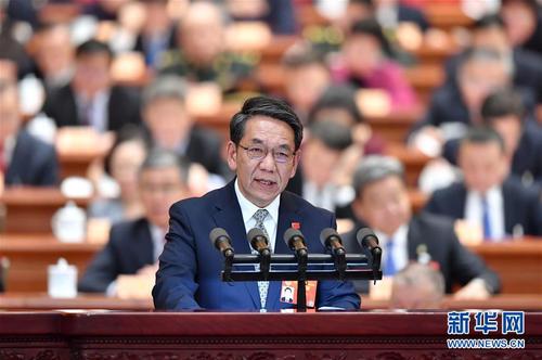 吴伟仁委员作大会发言。 新华社记者 殷博古 摄