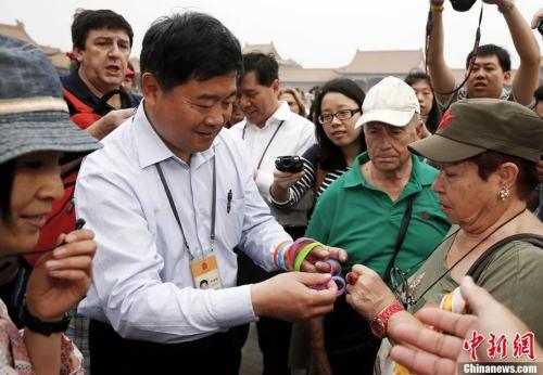 资料图:单霁翔。<a target='_blank' href='http://www.chinanews.com/'>中新社</a>发 刘关关 摄 点击进入下一页