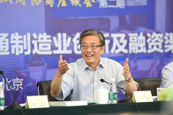 2、全国政协委员屠光绍