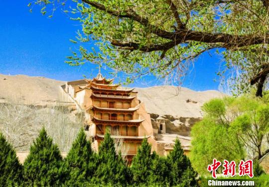 敦煌研究院匠心呵护遗产发出文化?；ぁ爸泄簟? style=